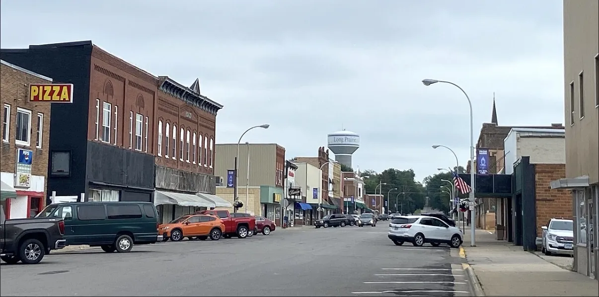 Downtown Long Prairie, Minnesota, with the Long Prairie water tower above Central Avenue
